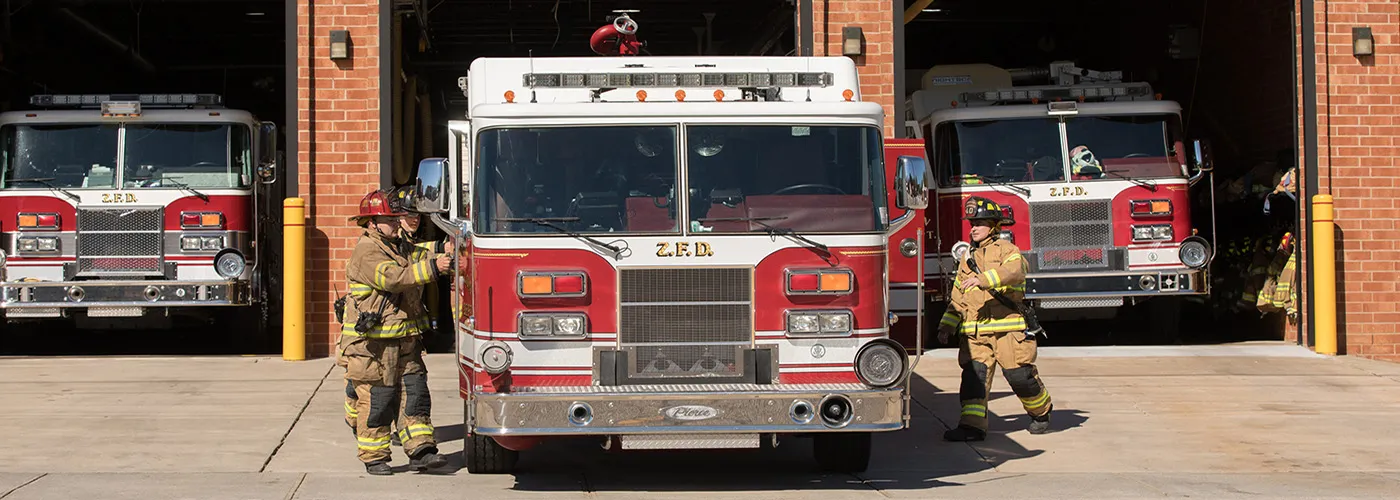 Fire Trucks in Front of Fire Station